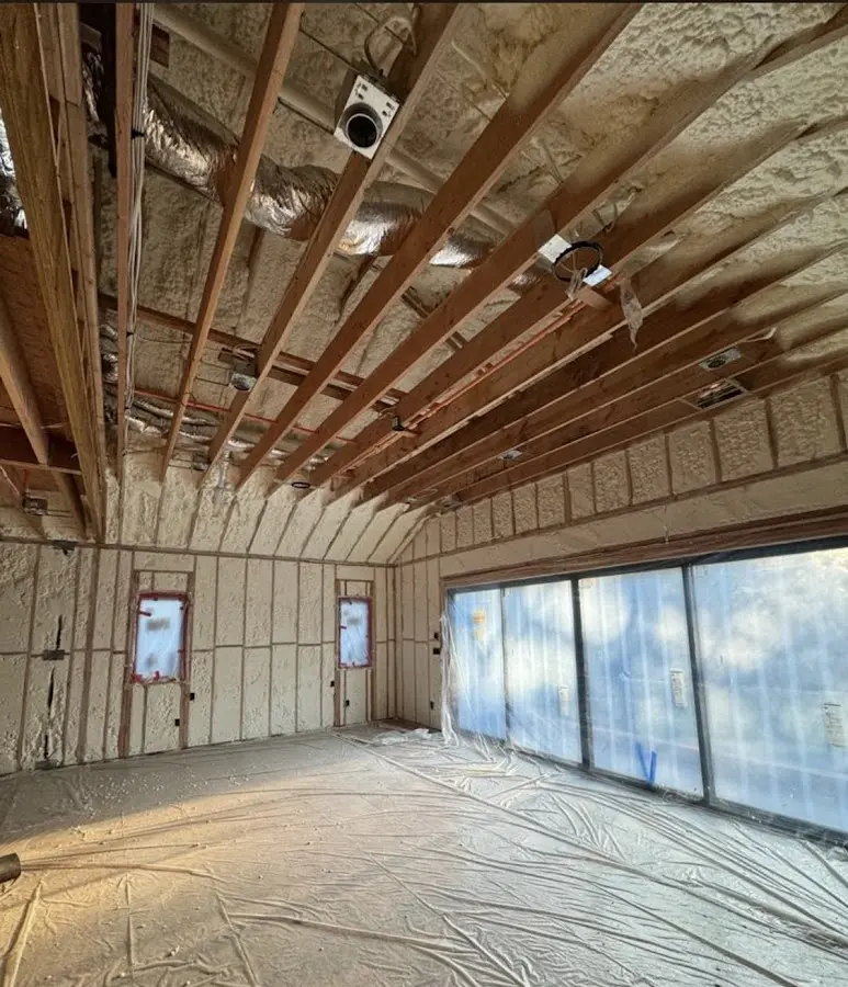 Interior walls and ceiling insulated with spray foam during new construction in Westlake